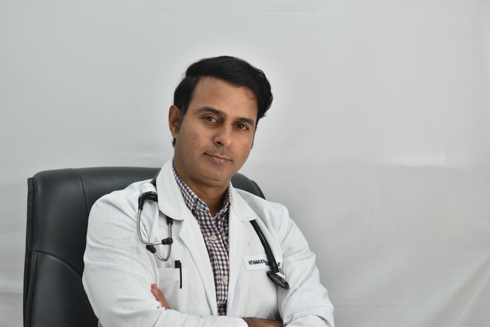Dr. Mangesh Kamath